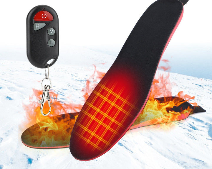 Pair of heated insoles with remote